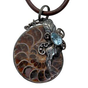 Ammonite slice on brown leather cord necklace sterling silver blue topaz pendant